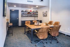 The Gallery room showing a table that seats 8 people